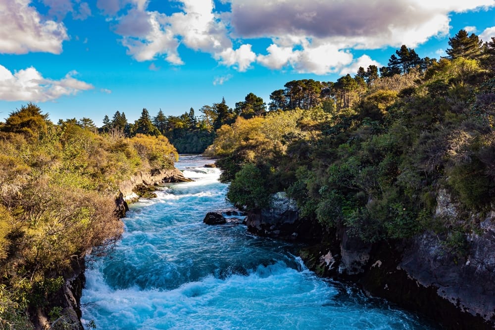 Rumbling, stormy, frothy waterfall of Huka Falls. Waikato River, North Island, New Zealand.